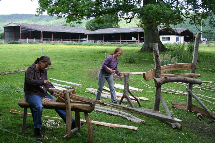 Frances and Amy riving the timber